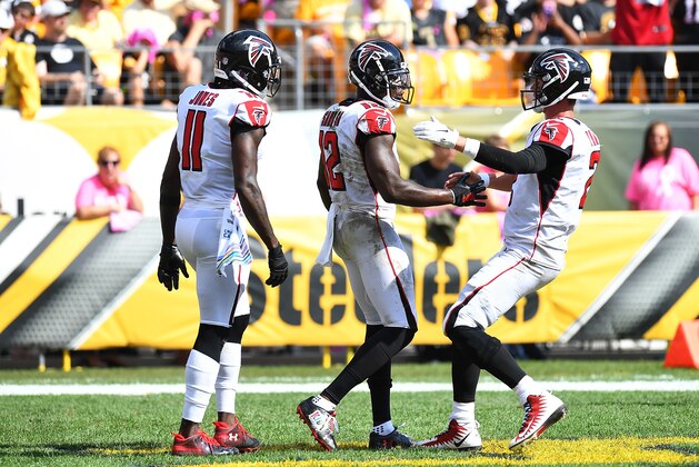 PITTSBURGH, PA - OCTOBER 07: Mohamed Sanu #12 of the Atlanta Falcons celebrates with Matt Ryan #2 of the Atlanta Falcons and Julio Jones #11 after a 43-yard touchdown reception in the first half during the game at Heinz Field on October 7, 2018 in Pittsburgh, Pennsylvania. (Photo by Joe Sargent/Getty Images)