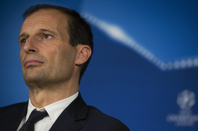 Juventus' head coach Massimiliano Allegri listens to a question during a news conference at the Santiago Bernabeu stadium in Madrid, Tuesday, April 10, 2018. Juventus will play a Champions League quarter final second leg soccer match with Real Madrid on Wednesday 11. (AP Photo/Francisco Seco)