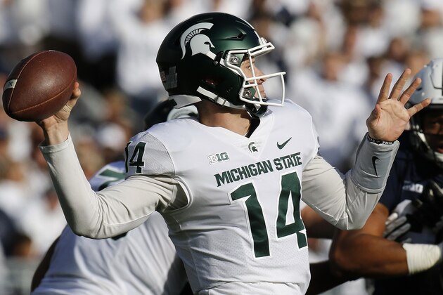 STATE COLLEGE, PA - OCTOBER 13:  Brian Lewerke #14 of the Michigan State Spartans passes against the Penn State Nittany Lions on October 13, 2018 at Beaver Stadium in State College, Pennsylvania.  (Photo by Justin K. Aller/Getty Images)