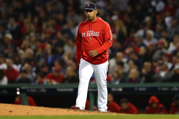 BOSTON, MA - OCTOBER 06:  Manager Alex Cora #20 of the Boston Red Sox walks to the mound during the sixth inning of Game Two of the American League Division Series against the New York Yankees at Fenway Park on October 6, 2018 in Boston, Massachusetts.  (Photo by Tim Bradbury/Getty Images)