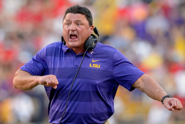 LSU coach Ed Orgeron celebrates a score against Georgia during the second half of an NCAA college football game in Baton Rouge, La., Saturday, Oct. 13, 2018. (AP Photo/Matthew Hinton)