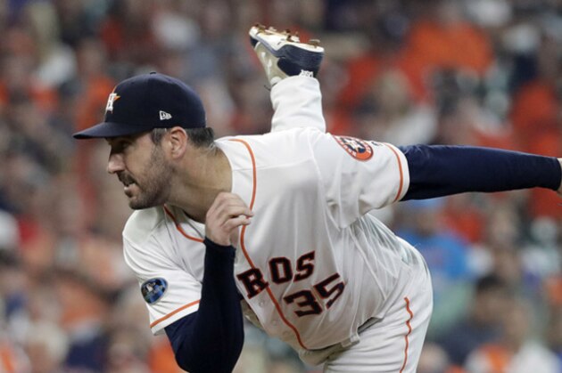 Houston Astros starting pitcher Justin Verlander (35) delivers a pitch against the Cleveland Indians during the first inning in Game 1 of an American League Division Series baseball game Friday, Oct. 5, 2018, in Houston. (AP Photo/David J. Phillip)
