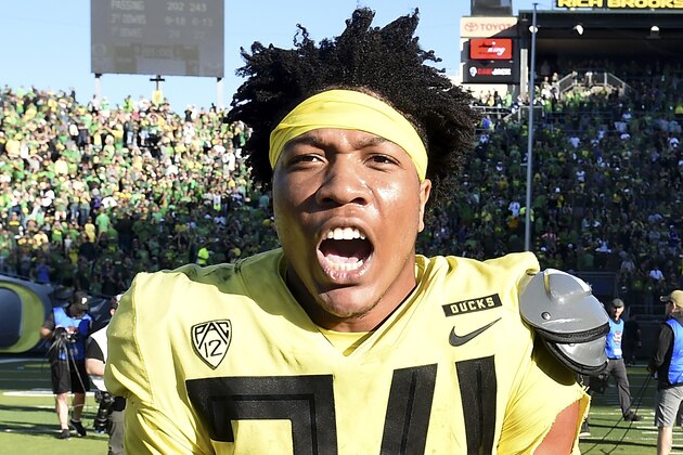 EUGENE, OR - OCTOBER 13:  Running back CJ Verdell #34 of the Oregon Ducks celebrates after scoring the winning touchdown in overtime of the game against the Washington Huskies at Autzen Stadium on October 13, 2018 in Eugene, Oregon. The Ducks won the game 30-27.  (Photo by Steve Dykes/Getty Images)