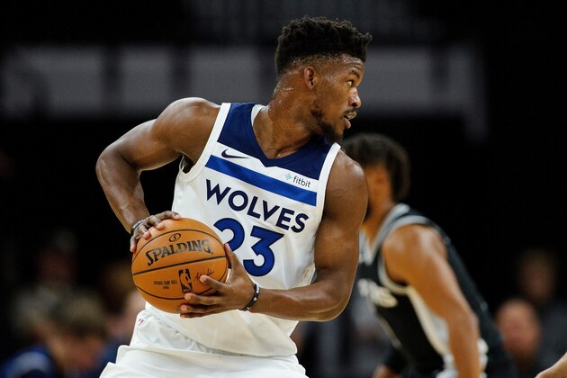 MINNEAPOLIS, MN - NOVEMBER 15: Jimmy Butler #23 of the Minnesota Timberwolves has the ball against the San Antonio Spurs during the game on November 15, 2017 at the Target Center in Minneapolis, Minnesota. NOTE TO USER: User expressly acknowledges and agrees that, by downloading and or using this Photograph, user is consenting to the terms and conditions of the Getty Images License Agreement. (Photo by Hannah Foslien/Getty Images)