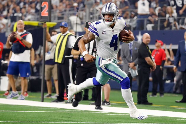 ARLINGTON, TX - OCTOBER 14: Dak Prescott #4 of the Dallas Cowboys runs the ball for a first quarter touchdown agaisnt the Jacksonville Jaguars at AT&T Stadium on October 14, 2018 in Arlington, Texas. (Photo by Wesley Hitt/Getty Images) ARLINGTON, TX - OCTOBER 14: Dak Prescott #4 of the Dallas Cowboys runs the ball for a first quarter touchdown agaisnt the Jacksonville Jaguars at AT&T Stadium on October 14, 2018 in Arlington, Texas. (Photo by Wesley Hitt/Getty Images)