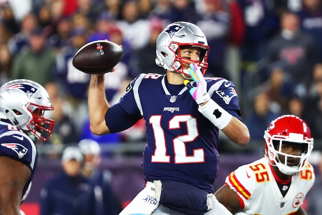 FOXBOROUGH, MA - OCTOBER 14:  Tom Brady #12 of the New England Patriots throws the football in the first quarter of a game against the Kansas City Chiefs at Gillette Stadium on October 14, 2018 in Foxborough, Massachusetts.  (Photo by Adam Glanzman/Getty Images)
