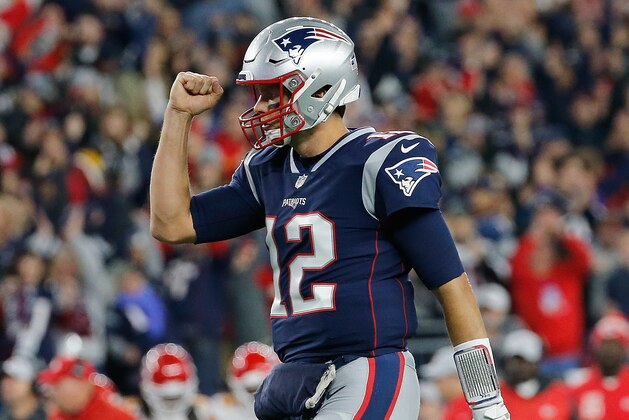 FOXBOROUGH, MA - OCTOBER 14: Tom Brady #12 of the New England Patriots celebrates a touchdown against the Kansas City Chiefs in the first quarter at Gillette Stadium on October 14, 2018 in Foxborough, Massachusetts. (Photo by Jim Rogash/Getty Images)