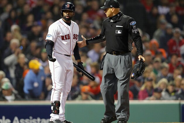BOSTON, MA - OCTOBER 14:  Jackie Bradley Jr. #19 of the Boston Red Sox argues the out call with umpire Vic Carapazza #19 during the sixth inning against the Houston Astros in Game Two of the American League Championship Series at Fenway Park on October 14, 2018 in Boston, Massachusetts.  (Photo by Maddie Meyer/Getty Images)