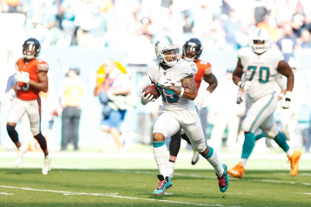 MIAMI, FL - OCTOBER 14:  Albert Wilson #15 of the Miami Dolphins carries a pass for a touchdown in the fourth quarter against the Chicago Bears of the game at Hard Rock Stadium on October 14, 2018 in Miami, Florida.  (Photo by Marc Serota/Getty Images)