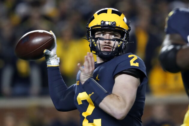 Michigan quarterback Shea Patterson throws during the first half of the team's NCAA football game against Wisconsin in Ann Arbor, Mich., Saturday, Oct. 13, 2018. (AP Photo/Paul Sancya)