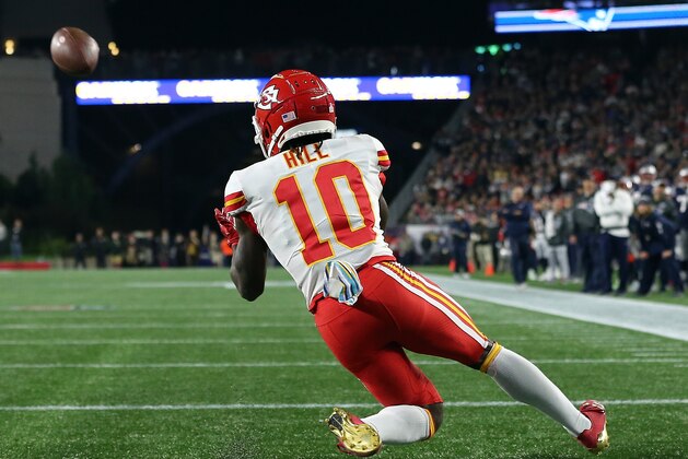 FOXBOROUGH, MA - OCTOBER 14: Tyreek Hill #10 of the Kansas City Chiefs catches a touchdown pass against the  New England Patriots in the fourth quarter at Gillette Stadium on October 14, 2018 in Foxborough, Massachusetts. (Photo by Jim Rogash/Getty Images)