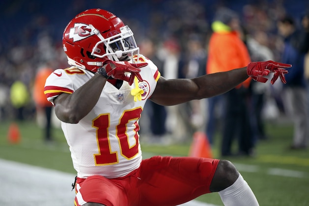 Kansas City Chiefs wide receiver Tyreek Hill strikes a pose as he warms up before an NFL football game, Sunday against the New England Patriots, Oct. 14, 2018, in Foxborough, Mass. (AP Photo/Michael Dwyer)