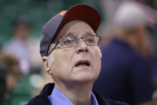 FILE - In this Oct. 12, 2015 file photo, Portland Trail Blazers owner Paul Allen looks on before the start of the first quarter of an NBA preseason basketball game against the Utah Jazz in Salt Lake City. Allen, billionaire owner of the Trail Blazers and the Seattle Seahawks and Microsoft co-founder, says cancer he was treated for in 2009 has returned. Allen made the announcement Monday, Oct. 1, 2018 on Twitter, saying he recently learned of the non-Hodgkin's lymphoma and that his team of doctors has started treatment. (AP Photo/Rick Bowmer, File)