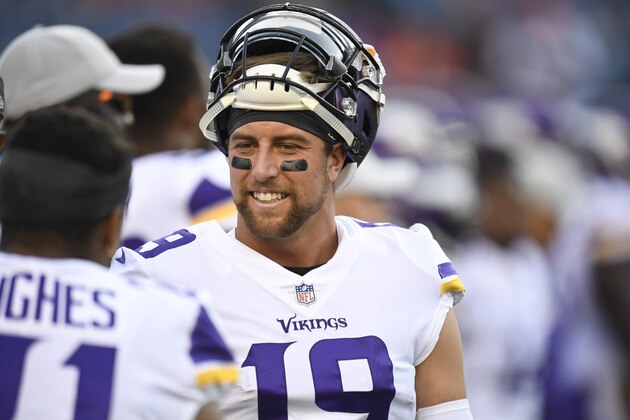 Minnesota Vikings wide receiver Adam Thielen warms up before an NFL football game against the Denver Broncos Saturday, Aug. 11, 2018, in Denver. (AP Photo/Mark Reis)