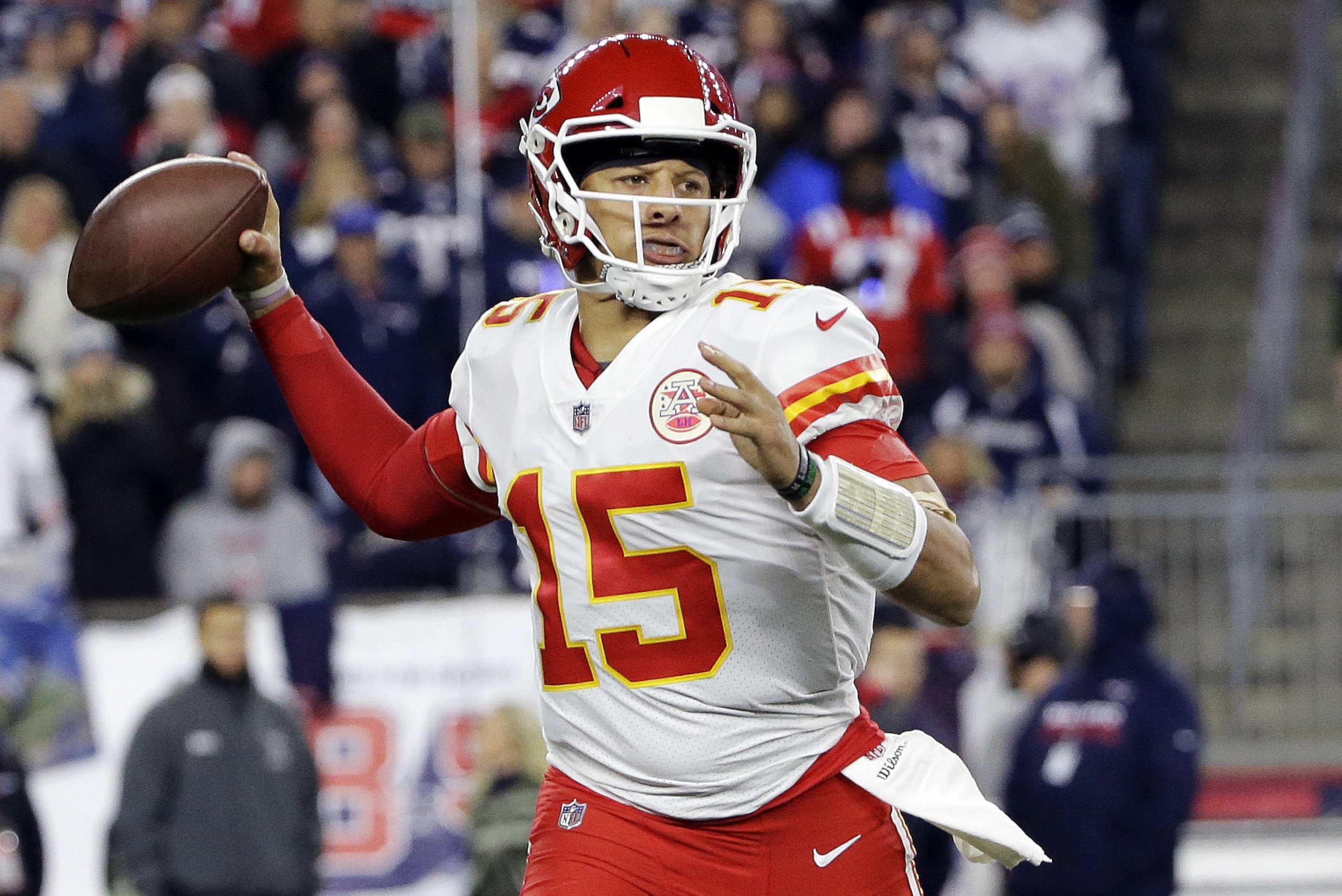 Kansas City Chiefs quarterback Patrick Mahomes rolls out to pass against the New England Patriots during the first half of an NFL football game, Sunday, Oct. 14, 2018, in Foxborough, Mass. (AP Photo/Steven Senne) Kansas City Chiefs quarterback Patrick Mahomes rolls out to pass against the New England Patriots during the first half of an NFL football game, Sunday, Oct. 14, 2018, in Foxborough, Mass. (AP Photo/Steven Senne)