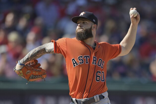 Houston Astros starting pitcher Dallas Keuchel delivers in the second inning during Game 3 of the baseball American League Division Series against the Cleveland Indians, Monday, Oct. 8, 2018, in Cleveland. (AP Photo/David Dermer)