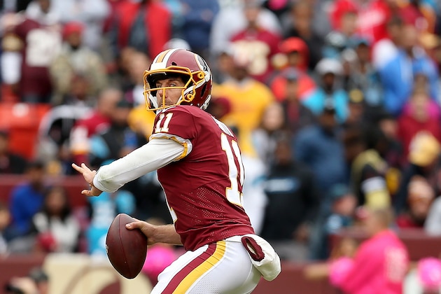 LANDOVER, MD - OCTOBER 14: Alex Smith #11 of the Washington Redskins looks to pass during the second half against the Carolina Panthers at FedExField on October 14, 2018 in Landover, Maryland. (Photo by Will Newton/Getty Images)