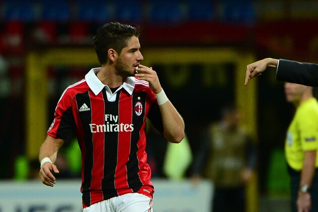 AC Milan's coach Massimiliano Allegri (R) speaks to AC Milan's Brazilian forward Pato during the Champions league football match AC Milan vs Malaga on November 6, 2012 at San Siro Stadium in Milan. AFP PHOTO / OLIVIER MORIN        (Photo credit should read OLIVIER MORIN/AFP/Getty Images)