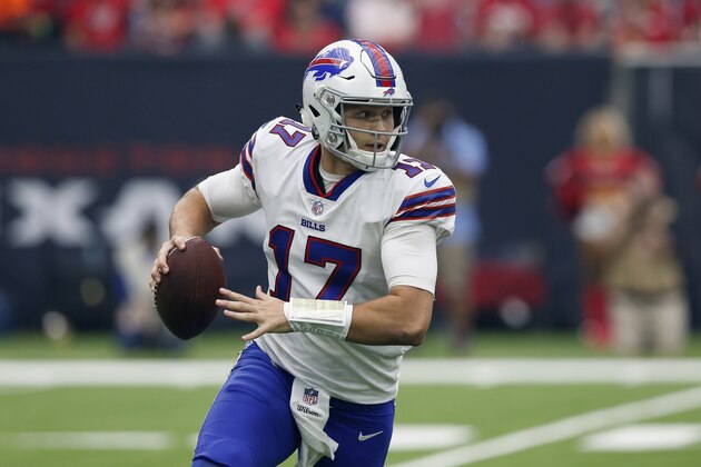 HOUSTON, TX - OCTOBER 14:  Josh Allen #17 of the Buffalo Bills rolls out in the first quarter against the Houston Texans at NRG Stadium on October 14, 2018 in Houston, Texas.  (Photo by Tim Warner/Getty Images)