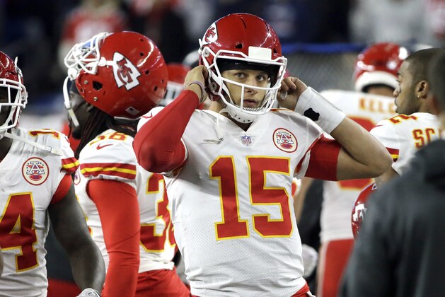 Kansas City Chiefs quarterback Patrick Mahomes removes his helmet on the sideline during the second half of an NFL football game against the New England Patriots, Sunday, Oct. 14, 2018, in Foxborough, Mass. (AP Photo/Steven Senne)