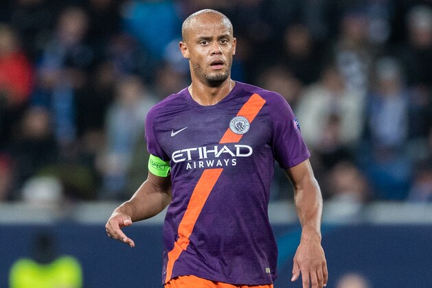 SINSHEIM, GERMANY - OCTOBER 02: Vincent Kompany of Manchester City runs with the ball during the Group F match of the UEFA Champions League between TSG 1899 Hoffenheim and Manchester City at Wirsol Rhein-Neckar-Arena on October 2, 2018 in Sinsheim, Germany. (Photo by Boris Streubel/Getty Images)