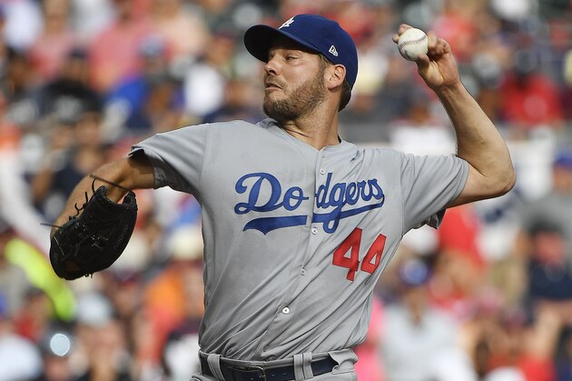 Los Angeles Dodgers starting pitcher Rich Hill (44) delivers during the first inning in Game 4 of baseball's National League Division Series against the Atlanta Braves, Monday, Oct. 8, 2018, in Atlanta. (AP Photo/John Amis)