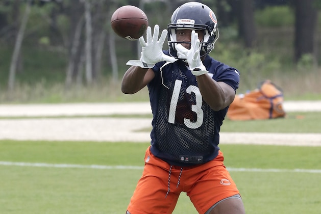 Chicago Bears wide receiver Bennie Fowler catches a pass during practice at the NFL football team's training camp Wednesday, May 30, 2018, in Lake Forest, Ill. (AP Photo/Charles Rex Arbogast)