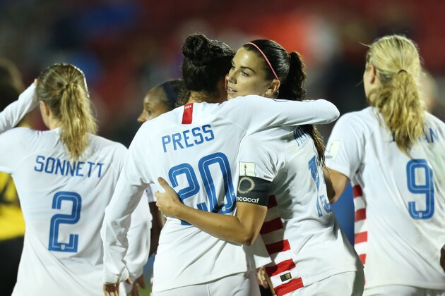 FRISCO, TX - OCTOBER 14: Alex Morgan of USA celebrates after scoring a goal during the semifinal match between Jamaica and United States as part of CONCACAF Women's Championship at Toyota Stadium on October 14, 2018 in Frisco, Texas. (Photo by Omar Vega/Getty Images)