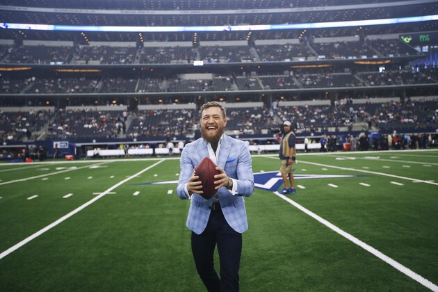 UFC fighter Conor McGregor is seen on the sidelines before an NFL football game between the Dallas Cowboys and the Jacksonville Jaguars in Arlington, Texas, Sunday, Oct. 14, 2018. (AP Photo/Jim Cowsert)