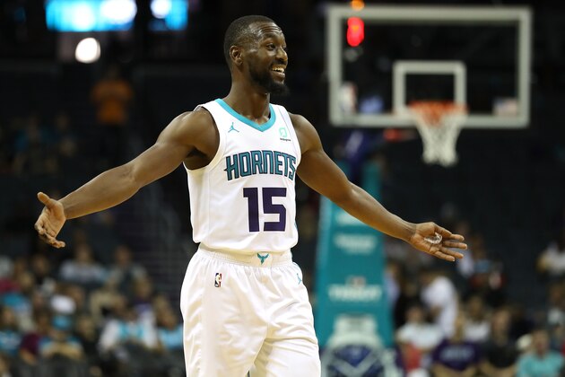 CHARLOTTE, NC - OCTOBER 02:  Kemba Walker #15 of the Charlotte Hornets reacts after a play against the Miami Heat during their game at Spectrum Center on October 2, 2018 in Charlotte, North Carolina. NOTE TO USER: User expressly acknowledges and agrees that, by downloading and or using this photograph, User is consenting to the terms and conditions of the Getty Images License Agreement.  (Photo by Streeter Lecka/Getty Images)