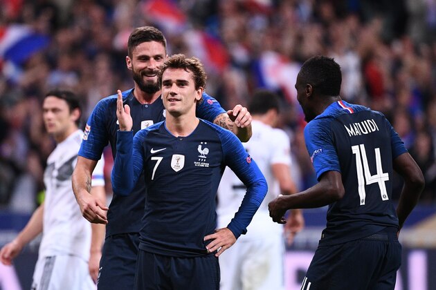 France's forward Antoine Griezmann (C) celebrates after scoring their second goal on a penalty kick during the UEFA Nations League football match between France and Germany at the Stade de France in Saint-Denis, near Paris on October 16, 2018. (Photo by FRANCK FIFE / AFP)        (Photo credit should read FRANCK FIFE/AFP/Getty Images)