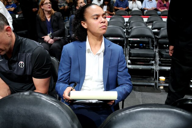WASHINGTON, D.C. - OCTOBER 5: Kristi Toliver sits on the bench as an assistant coach of Washington Wizards during a pre-season game against the Miami Heat on October 5, 2018 at Capital One Arena, in Washington, D.C.  NOTE TO USER: User expressly acknowledges and agrees that, by downloading and/or using this Photograph, user is consenting to the terms and conditions of the Getty Images License Agreement. Mandatory Copyright Notice: Copyright 2018 NBAE (Photo by Ned Dishman/NBAE via Getty Images)