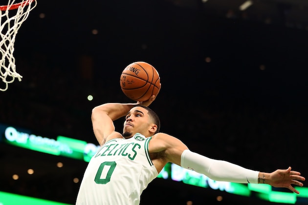 BOSTON, MA - OCTOBER 14:  Jayson Tatum #0 of the Boston Celtics dunks the ball during a game against the Philadelphia 76ers at TD Garden on October 16, 2018 in Boston, Massachusetts. NOTE TO USER: User expressly acknowledges and agrees that, by downloading and or using this photograph, User is consenting to the terms and conditions of the Getty Images License Agreement. (Photo by Adam Glanzman/Getty Images)