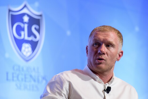 Former Manchester United and England football player Paul Scholes speaks in Hong Kong on August 8, 2018, during a promotional event in which he signed as Principal of the 433 Token cryptocurrency initiative. - Scholes is in Hong Kong to promote 433 Token, a blockchain-based system that will allow football fans to support young talent and interact with stars. (Photo by Anthony WALLACE / AFP)        (Photo credit should read ANTHONY WALLACE/AFP/Getty Images)
