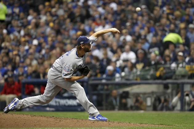 Los Angeles Dodgers starting pitcher Clayton Kershaw throws during the second inning of Game 1 of the National League Championship Series baseball game Friday, Oct. 12, 2018, in Milwaukee. (AP Photo/Jeff Roberson)