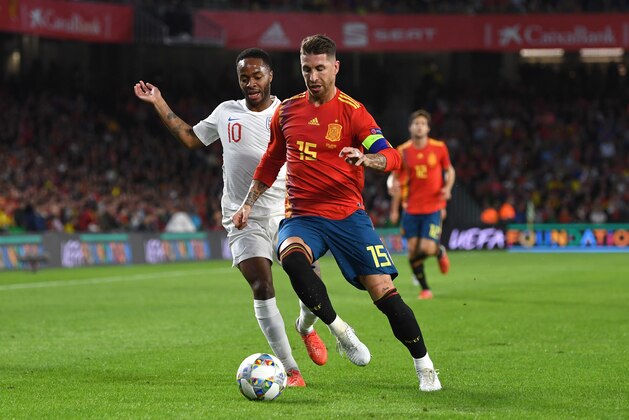 SEVILLE, SPAIN - OCTOBER 15:  Sergio Ramos of Spain shields the ball from Raheem Sterling of England during the UEFA Nations League A Group Four match between Spain and England at Estadio Benito Villamarin on October 15, 2018 in Seville, Spain.  (Photo by Michael Regan/Getty Images)