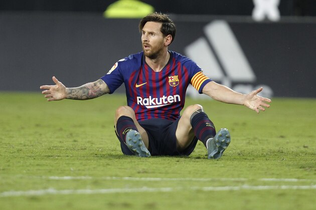 Barcelona forward Lionel Messi reacts after failing to score against Valencia during the Spanish La Liga soccer match between Valencia and Barcelona, at the Mestalla stadium in Valencia, Spain, Sunday, Oct. 7, 2018. (AP Photo/Alberto Saiz)
