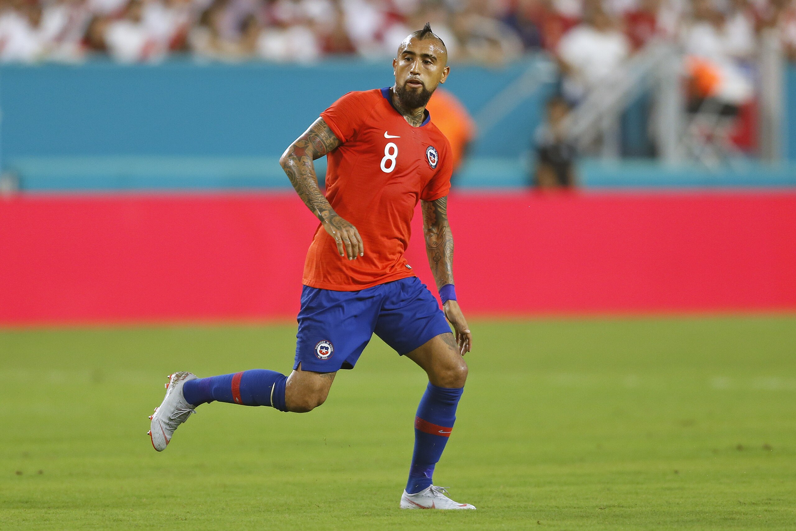 MIAMI GARDENS, FL - OCTOBER 12: Arturo Vidal #8 of Chile runs up field against Peru during an International friendly match on October 12, 2018 at Hard Rock Stadium in Miami Gardens, Florida. Peru defeated Chile 3-0. (Photo by Joel Auerbach/Getty Images)