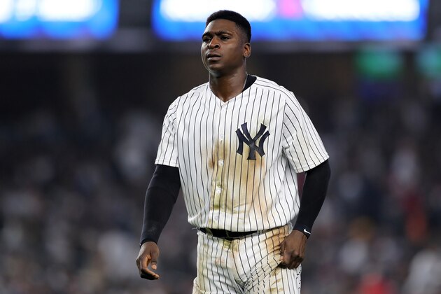 NEW YORK, NEW YORK - OCTOBER 08:   Didi Gregorius #18 of the New York Yankees reacts against the Boston Red Sox during the fifth inning in Game Three of the American League Division Series at Yankee Stadium on October 08, 2018 in the Bronx borough of New York City. (Photo by Elsa/Getty Images)