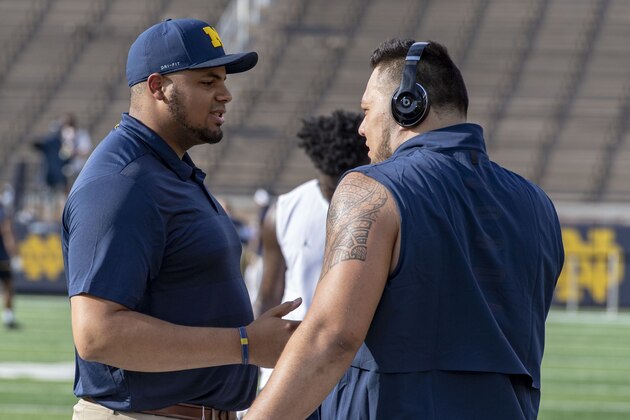 Michigan tight end Jake Butt (88) celebrates his touchdown with fullback Khalid Hill (80) and offensive lineman Grant Newsome (77) during the first quarter of an NCAA college football game against Hawaii at Michigan Stadium in Ann Arbor, Mich., Saturday, Sept. 3, 2016. (AP Photo/Tony Ding)