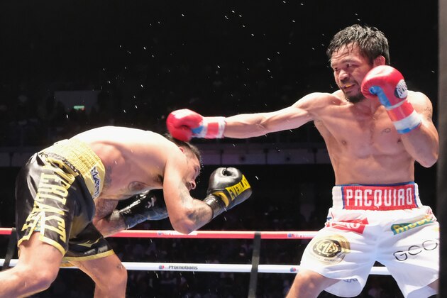 KUALA LUMPUR, MALAYSIA - JULY 15:  Manny Pacquiao of the Phillipines and Lucas Matthysse of Argintine in action on July 15, 2018 in Kuala Lumpur, Malaysia.  (Photo by How Foo Yeen/Getty Images)