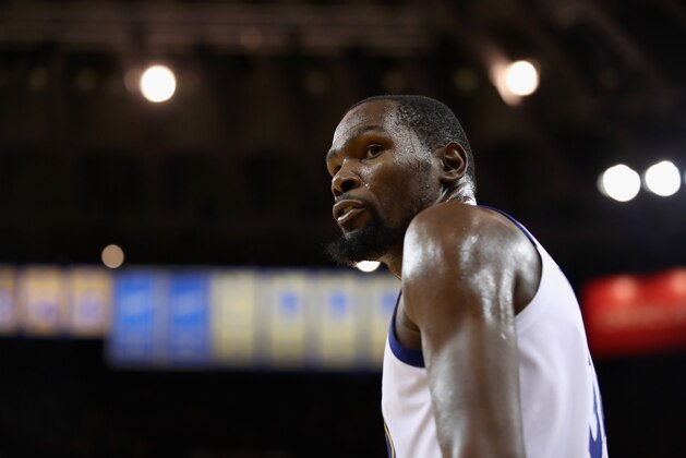 OAKLAND, CA - OCTOBER 16:  Kevin Durant #35 of the Golden State Warriors walks back down court during their game against the Oklahoma City Thunder at ORACLE Arena on October 16, 2018 in Oakland, California.  NOTE TO USER: User expressly acknowledges and agrees that, by downloading and or using this photograph, User is consenting to the terms and conditions of the Getty Images License Agreement.  (Photo by Ezra Shaw/Getty Images)