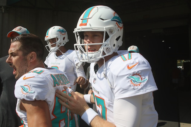 CINCINNATI, OH - OCTOBER 07:  Danny Amendola #80 and teammate Ryan Tannehill #17 of the Miami Dolphins prepare to take the field for their game against the Cincinnati Bengals at Paul Brown Stadium on October 7, 2018 in Cincinnati, Ohio. The Bengals defeated the Dolphins 27-17.  (Photo by John Grieshop/Getty Images)