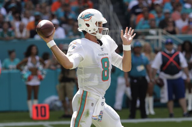 Miami Dolphins quarterback Brock Osweiler (8) looks to pass, during the first half of an NFL football game against the Chicago Bears, Sunday, Oct. 14, 2018, in Miami Gardens, Fla. (AP Photo/Lynne Sladky)