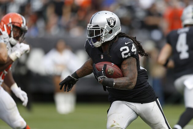 Oakland Raiders running back Marshawn Lynch (24) runs against the Cleveland Browns during an NFL football game in Oakland, Calif., Sunday, Sept. 30, 2018. (AP Photo/D. Ross Cameron)