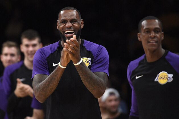 LOS ANGELES, CA - OCTOBER 04: LeBron James #23 of the Los Angeles Lakers celebrates after teammate Brandon Ingram #14 stole the in bound ball from Cameron Reynolds #13 of the Sacramento Kings at end of the game at Staples Center on October 4, 2018 in Los Angeles, California. NOTE TO USER: User expressly acknowledges and agrees that, by downloading and or using this photograph, User is consenting to the terms and conditions of the Getty Images License Agreement. (Photo by Kevork Djansezian/Getty Images)