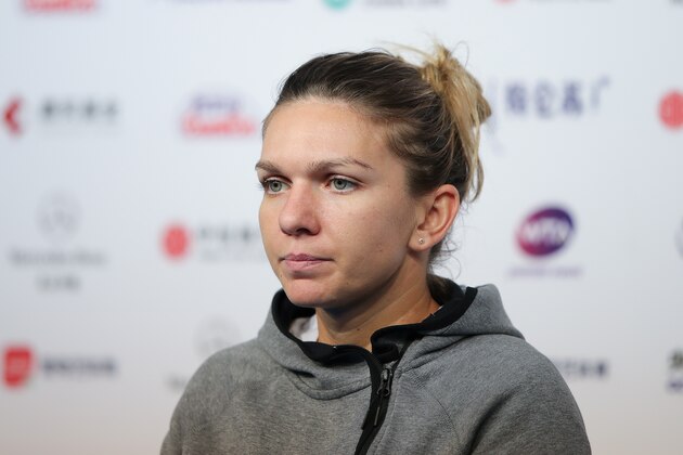 BEIJING, CHINA - SEPTEMBER 30:  Simona Halep of Romania reacts during a press conference after losing to Ons Jabeur of Tunisia in their Women's Singles 1nd Round match of the 2018 China Open at the China National Tennis Centre on September 30, 2018 in Beijing, China.  (Photo by Lintao Zhang/Getty Images)