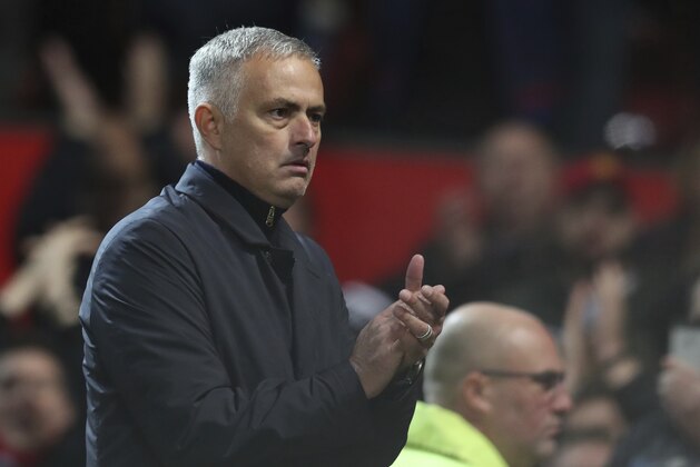 Manchester United's manager Jose Mourinho walks from the pitch after the end of the English Premier League soccer match between Manchester United and Newcastle United at Old Trafford in Manchester, England, Saturday, Oct. 6, 2018.Man Utd won the game 3-2. (AP Photo/Jon Super)