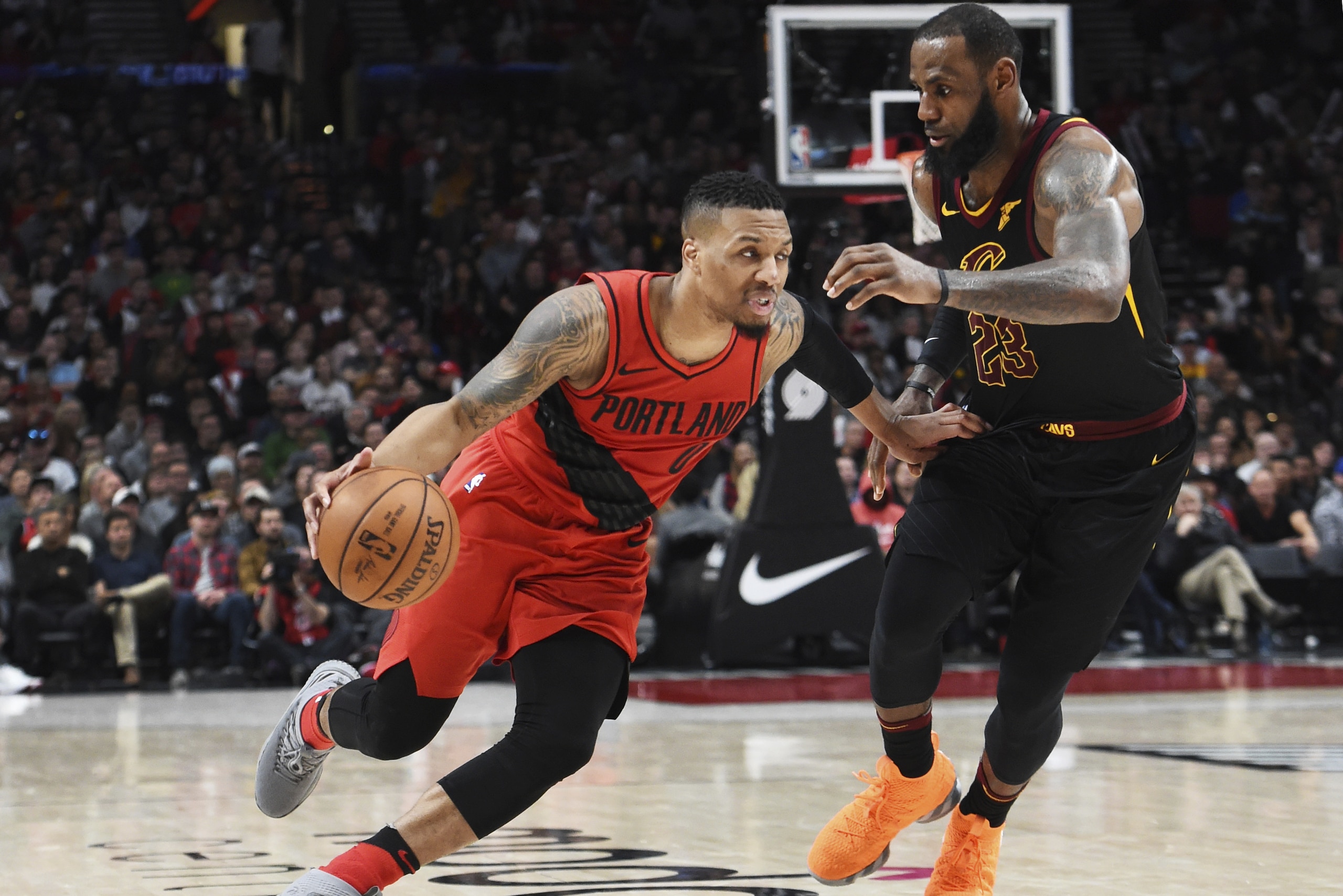 Portland Trail Blazers guard Damian Lillard drives to the basket past Cleveland Cavaliers forward LeBron James during the second half of an NBA basketball game in Portland, Ore., Thursday, March 15, 2018. The Blazers won 113-105. (AP Photo/Steve Dykes) Portland Trail Blazers guard Damian Lillard drives to the basket past Cleveland Cavaliers forward LeBron James during the second half of an NBA basketball game in Portland, Ore., Thursday, March 15, 2018. The Blazers won 113-105. (AP Photo/Steve Dykes)