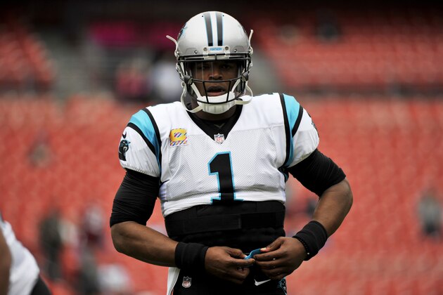 Carolina Panthers quarterback Cam Newton warms up prior to an NFL football game against the Washington Redskins, Sunday, Oct. 14, 2018, in Landover, Md. (AP Photo/Mark Tenally)